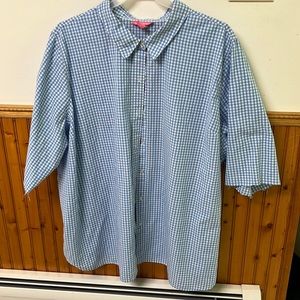 Woman within blue and white checked shirt